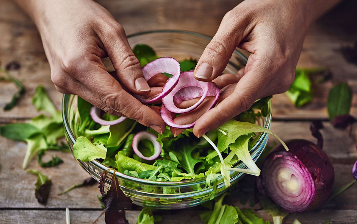 Hands Preparing Salad Hands Preparing Salad